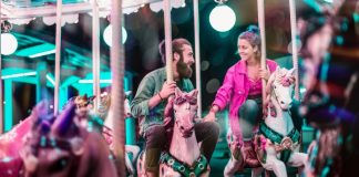 couple in love on carousel